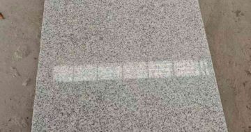 黑龙江芝麻白光面毛板