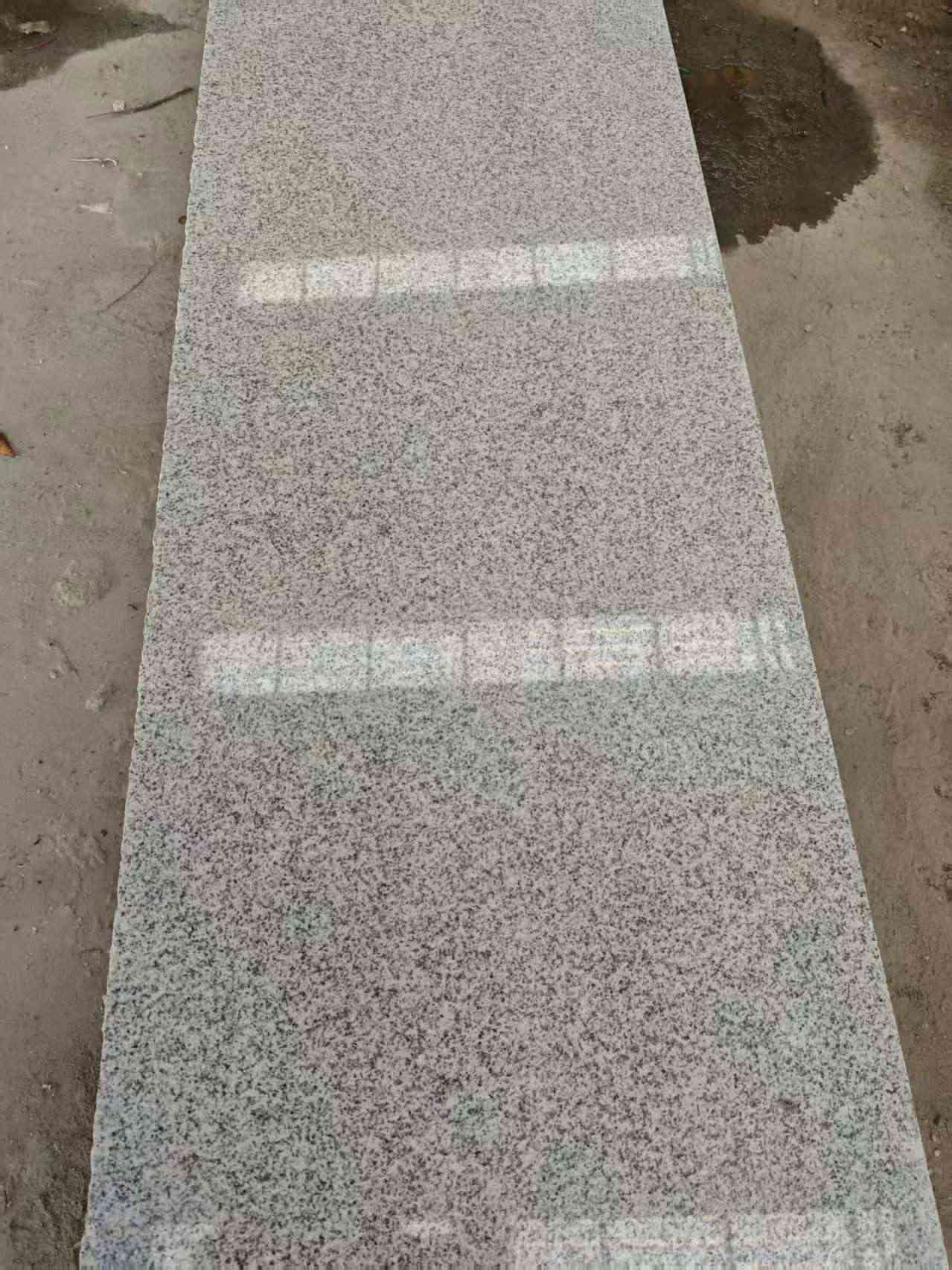 黑龙江芝麻白光面毛板